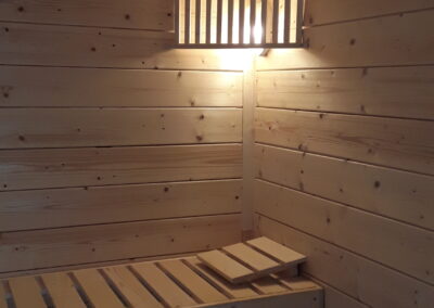 Inside. Light. Basic Corner Indoor Sauna