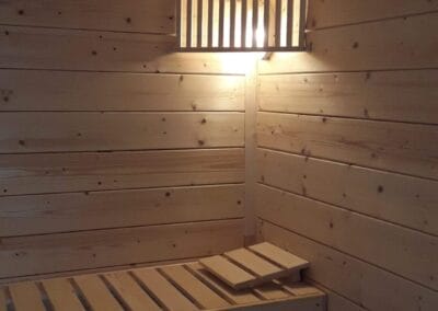 Inside. Light. Basic Corner Indoor Sauna