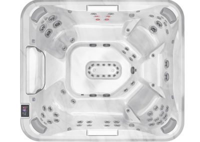 Top-down view of a square white hot tub with multiple built-in seats and numerous jet nozzles around the perimeter.