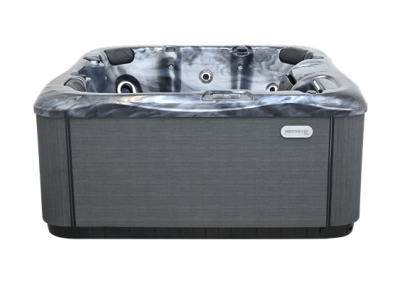 Rectangular grey hot tub with a marbled blue interior and built-in seating jets, isolated on a white background